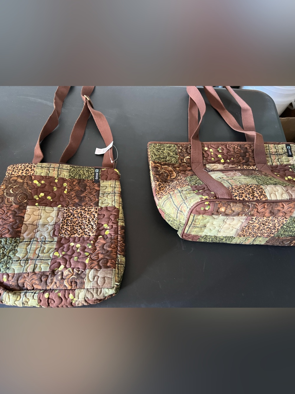 2 Donna Sharp bags 1- 11.5 x11.5
1- 16.5 x 12
I tote
1- crossbody
Safari